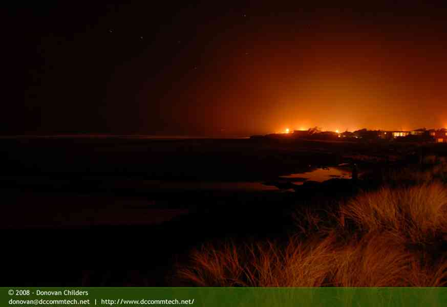Dune Grass and Rockaway Beach lights at night
